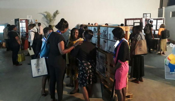 Visitors at the exhibition opening night at Design Hub Kampala