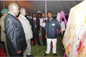 L-R, HE Pierre Nkurunziza, HE Y. K. Museveni and Roland Birutsya