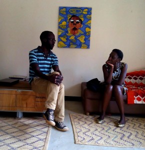 Ndema with curator Elise Atangana at his studio. 